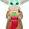 Gemmy Christmas Airblown Inflatable Inflatable Grogu™ With Frog In Stocking, 3.5 Ft Tall, Brown